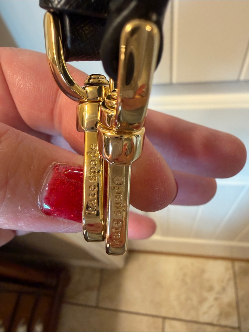 Black and gold Kate spade adjust adjustable purse strap